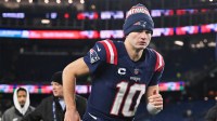 New England Patriots quarterback Drake Maye (10) runs off the field after the game against the Miami Dolphins at Gillette Stadium.