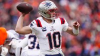 New England Patriots quarterback Drake Maye (10) drops back to pass against the Denver Broncos during the first half in the 2026 AFC Championship Game at Empower Field at Mile High.