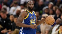 Golden State Warriors forward Draymond Green (23) brings the ball up court against the Milwaukee Bucks during the fourth quarter at Chase Center.