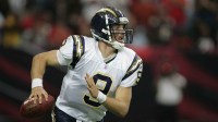 San Diego Chargers quarterback #9 Drew Brees scrambles out of the pocket against the Atlanta Falcons at the Georgia Dome.