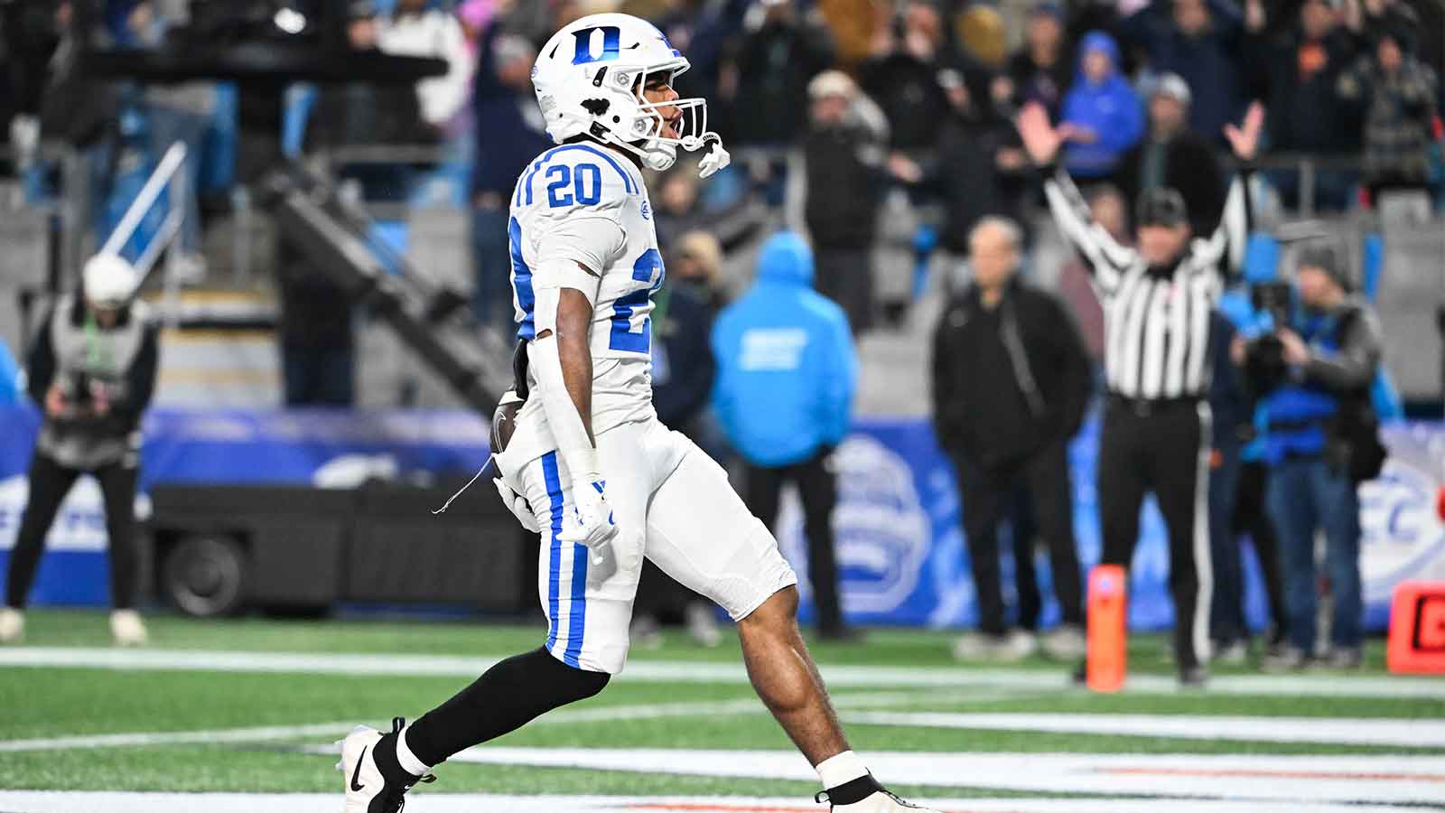 Duke Blue Devils running back Nate Sheppard (20) celebrates a touchdown in the second quarter against the Virginia Cavaliers during the 2025 ACC Championship game at Bank of America Stadium.