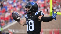Duke Blue Devils wide receiver Cooper Barkate (18) celebrates a touchdown during the third quarter against the NC State Wolfpack at Wallace Wade Stadium.