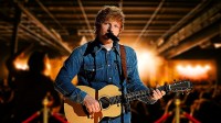 Ed Sheeran, who just began the 2026 Loop Tour, performing.