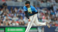 Miami Marlins starting pitcher Edward Cabrera (27) delivers a pitch against the New York Mets during the fifth inning at loanDepot Park.