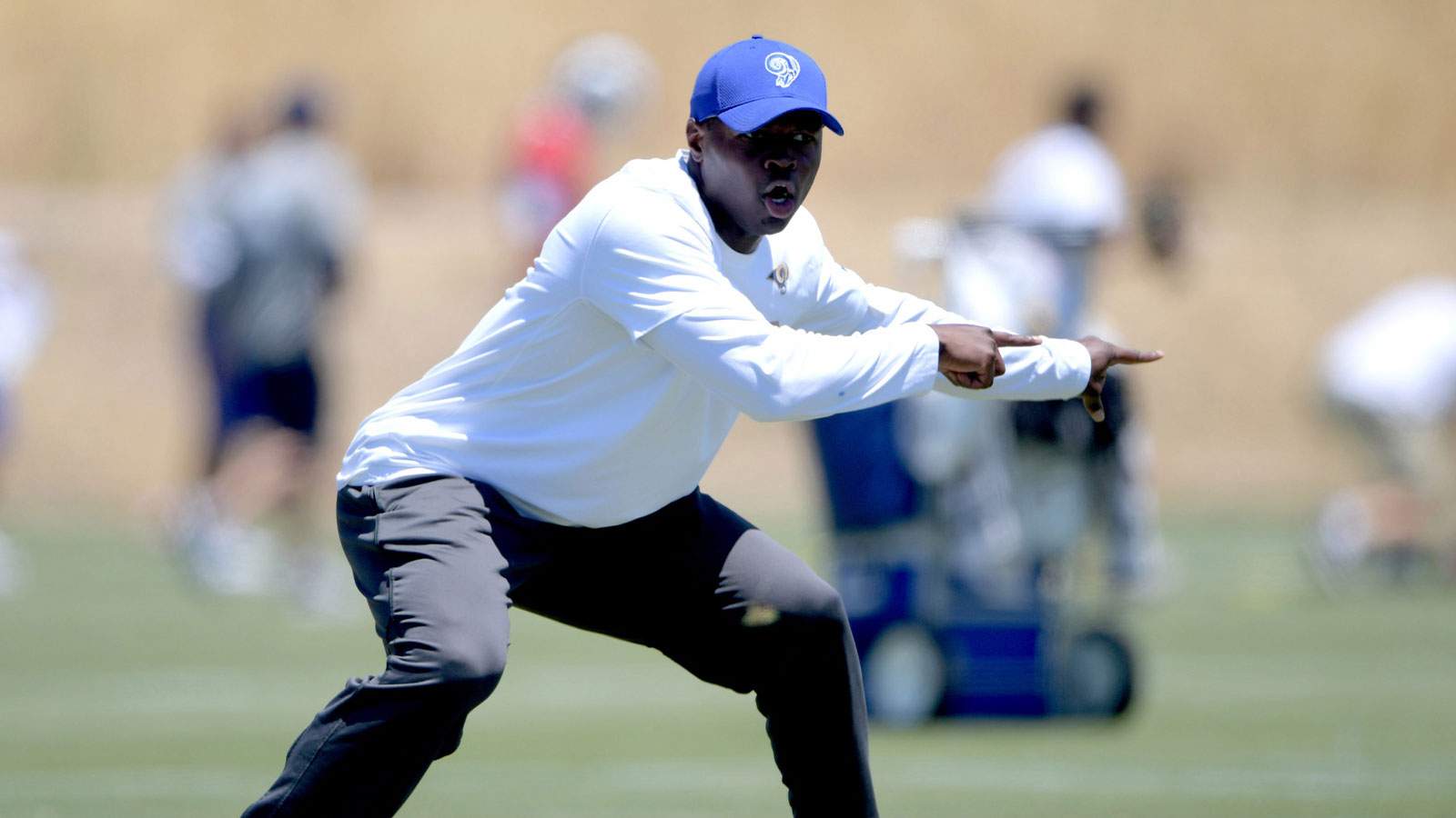Los Angeles Rams safeties coach Ejiro Evero reacts during organized team activities at Cal Lutheran University.