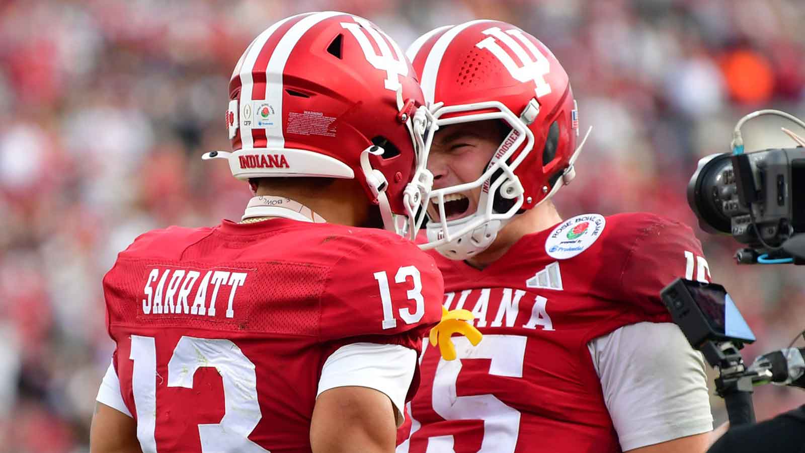 Indiana Hoosiers quarterback Fernando Mendoza (15) celebrates with wide receiver Elijah Sarratt (13) after a touchdown in the second half of the 2026 Rose Bowl and quarterfinal game of the College Football Playoff against the Alabama Crimson Tide at Rose Bowl Stadium.
