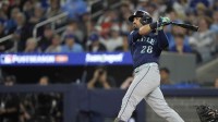 Seattle Mariners third baseman Eugenio Suarez (28) hits a single against the Toronto Blue Jays in the second inning during game seven of the ALCS round for the 2025 MLB playoffs at Rogers Centre.