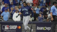 Seattle Mariners third baseman Eugenio Suarez (28) reacts to being called out on strikes in the eighth inning against the Toronto Blue Jays during game seven of the ALCS round for the 2025 MLB playoffs at Rogers Centre.