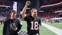 Atlanta Falcons quarterback Kirk Cousins (18) celebrates after a victory over the Los Angeles Rams at Mercedes-Benz Stadium.