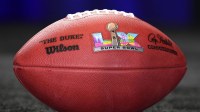 Feb 10, 2025; New Orleans, LA, USA; A Wilson official NFL Duke football with the Super Bowl LX (60) logo at the Super Bowl LIX host committee handoff press conference. Mandatory Credit: Kirby Lee-Imagn Images