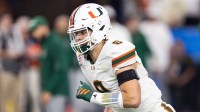 Miami Hurricanes quarterback Emory Williams (8) against the Mississippi Rebels during the 2026 Fiesta Bowl and semifinal game of the College Football Playoff at State Farm Stadium.