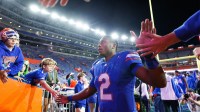 Florida Gators quarterback DJ Lagway (2) leaves the field after a game against the Florida State Seminoles at Ben Hill Griffin Stadium.
