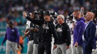 Baltimore Ravens head coach John Harbaugh stands on the sidelines during the third quarter against the Miami Dolphins at Hard Rock Stadium.