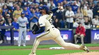 Milwaukee Brewers pitcher Freddy Peralta (51) throws a pitch against the Los Angeles Dodgers in the first inning during game two of the NLCS round for the 2025 MLB playoffs at American Family Field