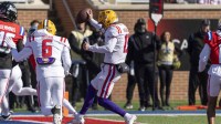 American quarterback Garrett Nussmeier (13) of LSU runs into the end zone for the game’s first touchdown during the fist half of the 2026 Senior Bowl at University of South Alabama, Hancock Whitney Stadium.