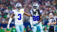 Dallas Cowboys wide receiver George Pickens (3) and Dallas Cowboys wide receiver CeeDee Lamb (88) react during the game against the Philadelphia Eagles at AT&T Stadium.