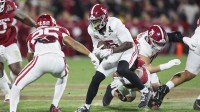 Alabama Crimson Tide wide receiver Germie Bernard (5) runs the ball in the second half against the Oklahoma Sooners at Gaylord Family OK Memorial Stadium.