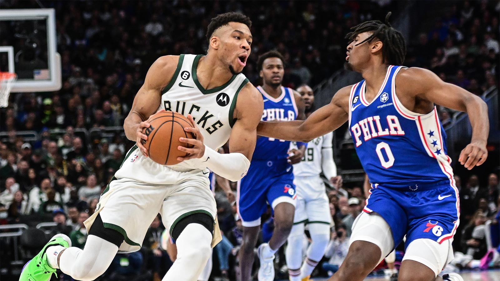 Milwaukee Bucks forward Giannis Antetokounmpo (34) drives for the basket against Philadelphia 76ers guard Tyrese Maxey (0) in the first quarter at Fiserv Forum.
