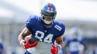 New York Giants tight end Theo Johnson (84) catches the ball during training camp at Quest Diagnostics Training Center.
