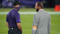 Baltimore Ravens head coach John Harbaugh (left) talks with team owner Steve Biscotti (right) prior to the game against the Kansas City Chiefs at M&T Bank Stadium