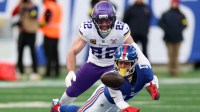 New York Giants wide receiver Wan'Dale Robinson (17) makes a catch against Minnesota Vikings free safety Harrison Smith (22) during the second half at MetLife Stadium.