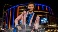 Harry Styles with Madison Square Garden, where he will perform 30 shows of his Together, Together Tour in 2026, in background.