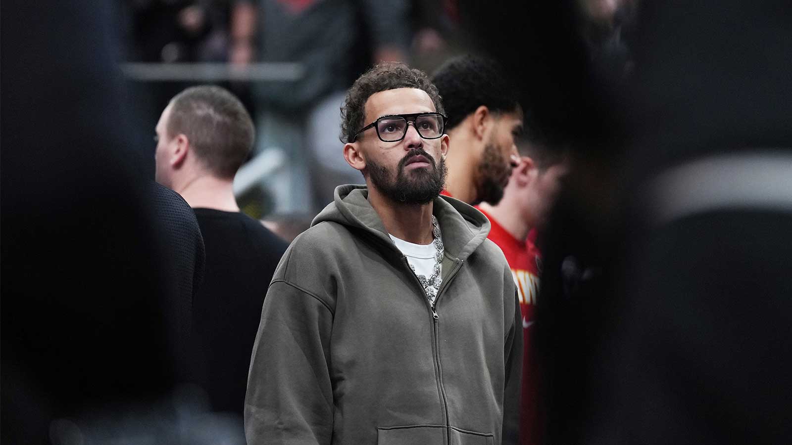 Atlanta Hawks guard Trae Young (11) watches the game from the bench during a time out in the second quarter against the Toronto Raptors at Scotiabank Arena.
