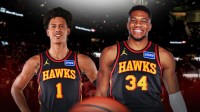 Giannis Antetokounmpo in Hawks uniform, with Jalen Johnson beside him