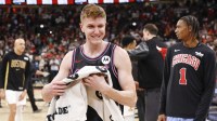 Chicago Bulls guard Kevin Huerter (13) celebrates after scoring a game winning three-pointer against the Boston Celtics at United Center.