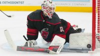 Carolina Hurricanes goaltender Brandon Bussi (32) makes a pad save against the Buffalo Sabres during the second period at Lenovo Center.