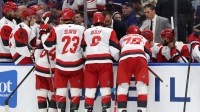 Carolina Hurricanes head coach Rod Brind'Amour talks with the team against the Tampa Bay Lightning during the second period at Benchmark International Arena.