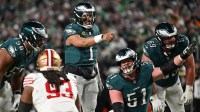 Philadelphia Eagles quarterback Jalen Hurts (1) calls a play at the line of scrimmage against the San Francisco 49ers during the second quarter in an NFC Wild Card Round game at Lincoln Financial Field.