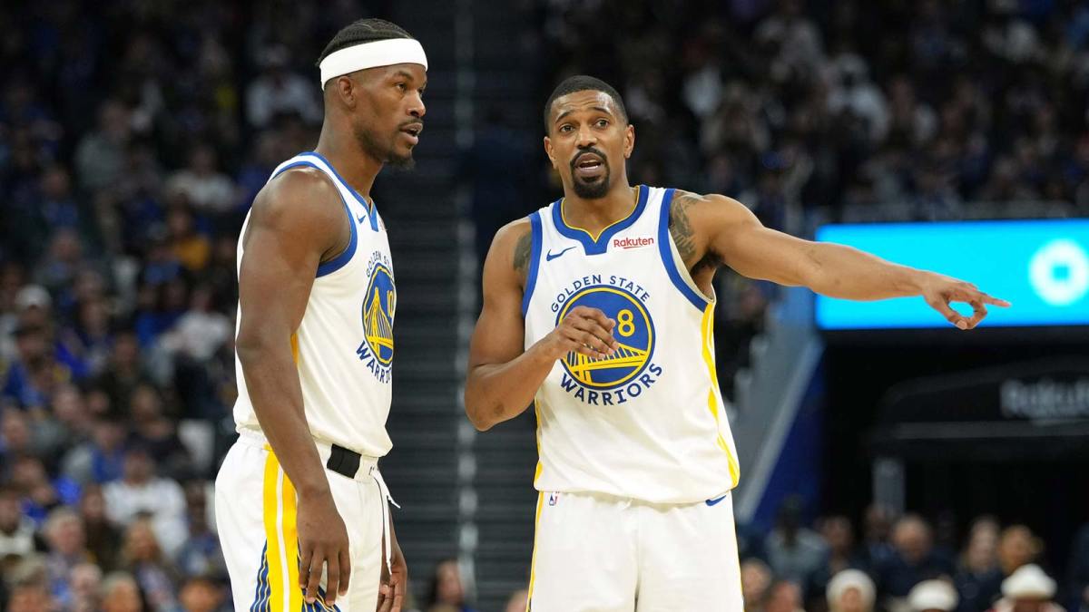Golden State Warriors guard De'Anthony Melton (8) talks with forward Jimmy Butler III (10) during the fourth quarter against the Dallas Mavericks at Chase Center.