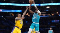 Charlotte Hornets forward Brandon Miller (24) shoots the ball against Los Angeles Lakers guard Marcus Smart (36) in the second half at Crypto.com Arena.