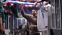 Boston Celtics forward Jayson Tatum (0) celebrates with fans after a victory over the Atlanta Hawks at State Farm Arena.