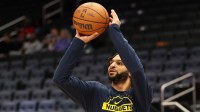 Denver Nuggets guard Jamal Murray (27) takes a shot before a game against the Washington Wizards at Capital One Arena.
