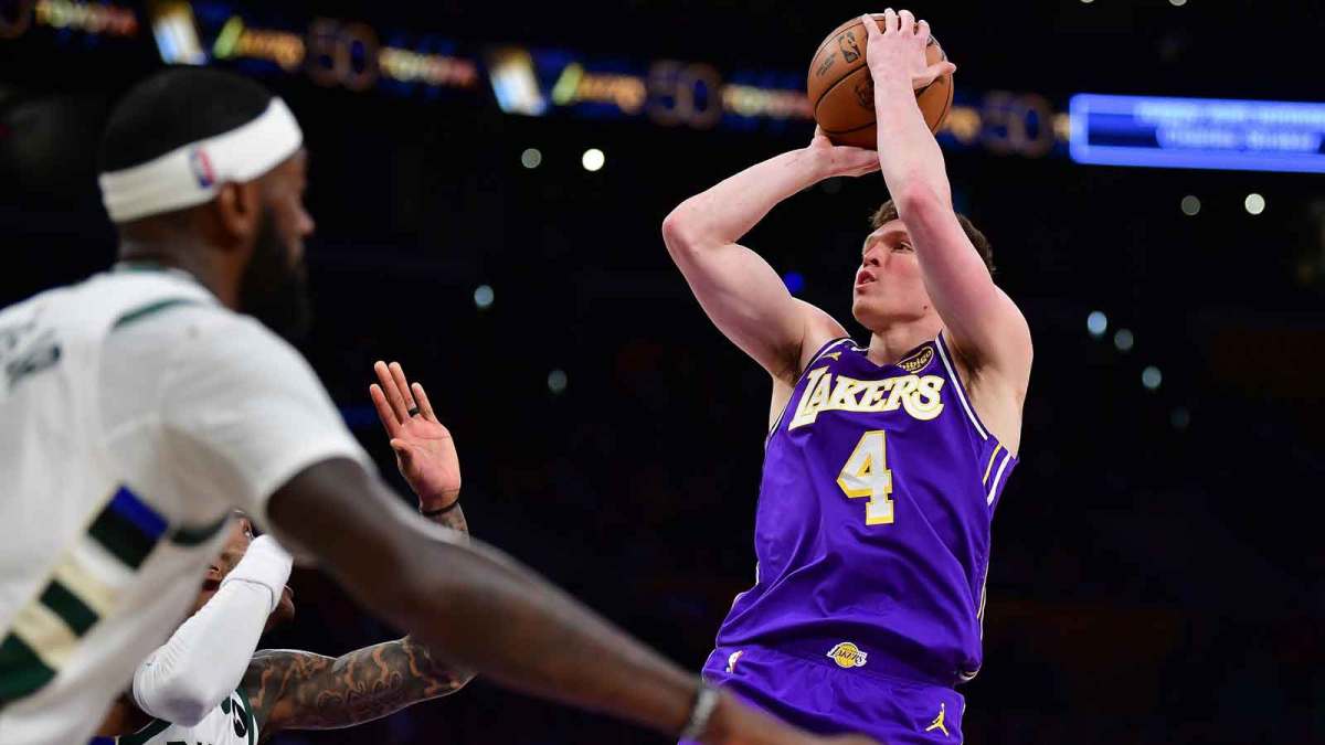 Los Angeles Lakers forward Dalton Knecht (4) shoots against the Milwaukee Bucks during the second half at Crypto.com Arena.