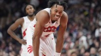 Toronto Raptors guard Scottie Barnes (4) reacts after dunking the ball against the New York Knicks during the second half at Scotiabank Arena.