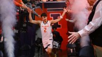 Illinois Fighting Illini guard Andrej Stojakovic (2) gets a hand as he takes the court with teammates before the first half against the Minnesota Golden Gophers at State Farm Center.