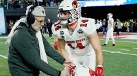 Illinois State linebacker Mason Kaplan (14) consoles defensive back Cam Wilson (25) after losing to Montana State in the FCS National Championship game at FirstBank Stadium in Nashville, Tenn.
