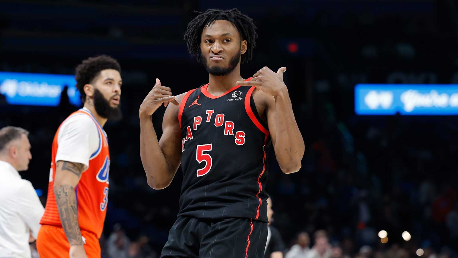 Toronto Raptors guard Immanuel Quickley (5) gestures after scoring a three point basket against the Oklahoma City Thunder during the second half at Paycom Center. 