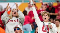 Indiana Hoosiers fans sit in the stands ahead of the College Football Playoff Championship game.