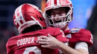 Indiana Hoosiers quarterback Fernando Mendoza (15) celebrates with Indiana Hoosiers wide receiver Omar Cooper Jr. (3) celebrate after connecting for a touchdown Friday, Jan. 9, 2026, during the Peach Bowl and semifinal game of the College Football Playoff against the Oregon Ducks at Mercedes-Benz Stadium in Atlanta.