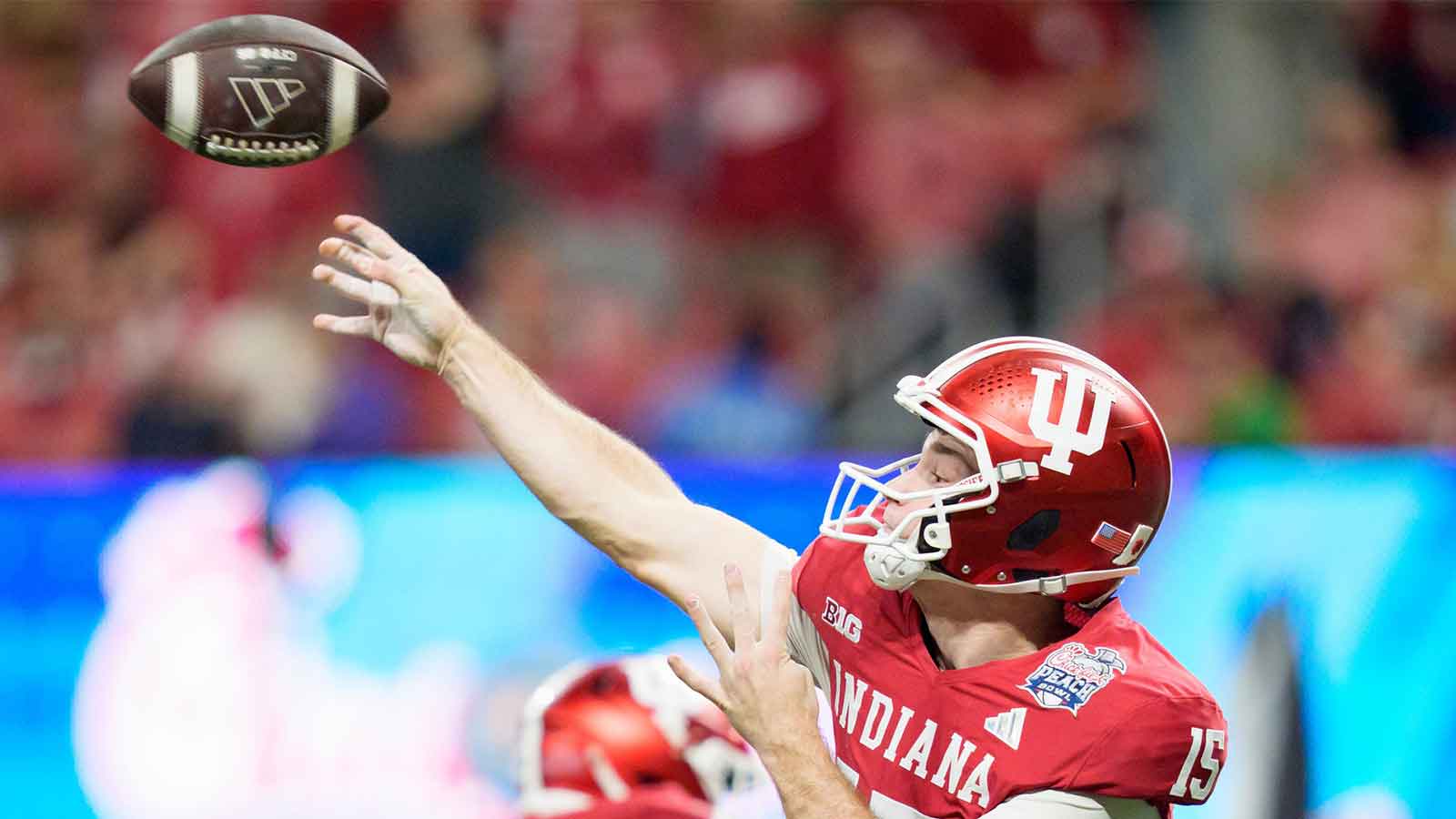 Indiana quarterback Fernando Mendoza throws a pass as the Oregon Ducks face the Indiana Hoosiers in the Peach Bowl on Jan. 9, 2026, at Mercedes-Benz Stadium in Atlanta, Georgia