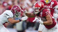 Indiana Hoosiers tight end Riley Nowakowski (37) rushes up the field against Alabama Crimson Tide defensive back Zabien Brown (2) on Thursday, Jan. 1, 2026, during the 112th annual Rose Bowl game in Pasadena. Indiana Hoosiers defeated Alabama Crimson Tide, 38-3.