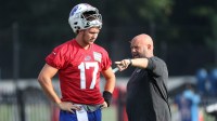 Buffalo Bills offensive coordinator Brian Daboll talks with quarterback Josh Allen during training camp on Aug. 15, 2018.