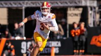 owa State Cyclones quarterback Rocco Becht (3) runs during the second half against the Oklahoma State Cowboys at Boone Pickens Stadium.