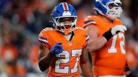 Denver Broncos running back J.K. Dobbins (27) in the fourth quarter against the Las Vegas Raiders at Empower Field at Mile High.