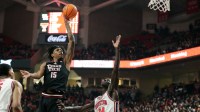 Texas Tech Red Raiders forward JT Toppin (15) shoots over Houston Cougars forward Kalifa Sakho (14) in the first half at United Supermarkets Arena.