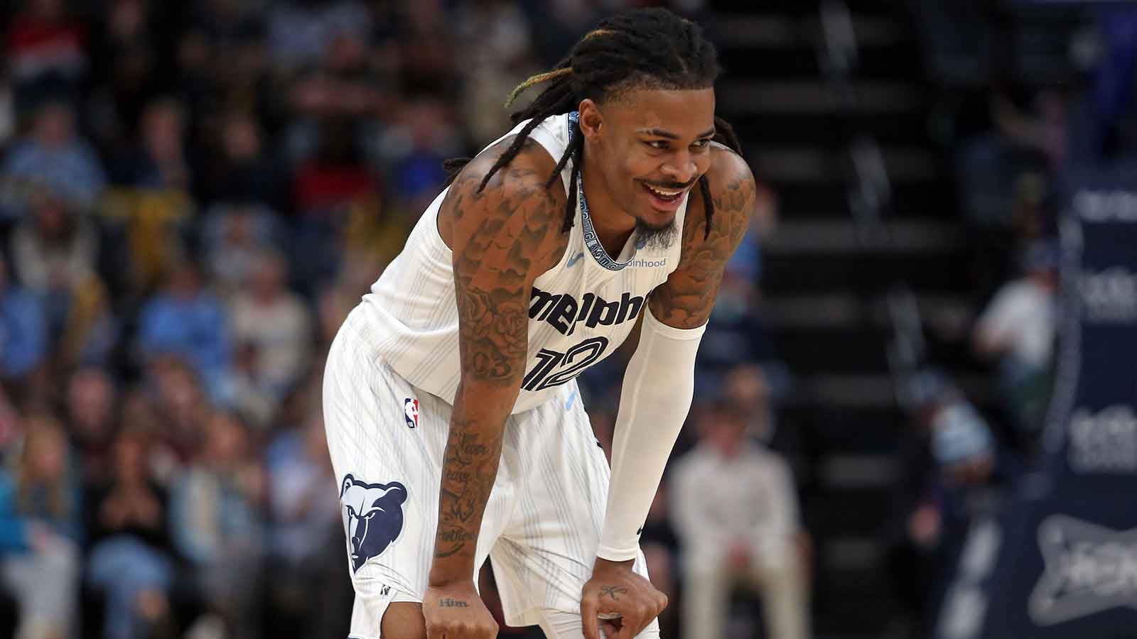 Memphis Grizzlies guard Ja Morant (12) reacts during the second quarter against the Milwaukee Bucks at FedExForum.